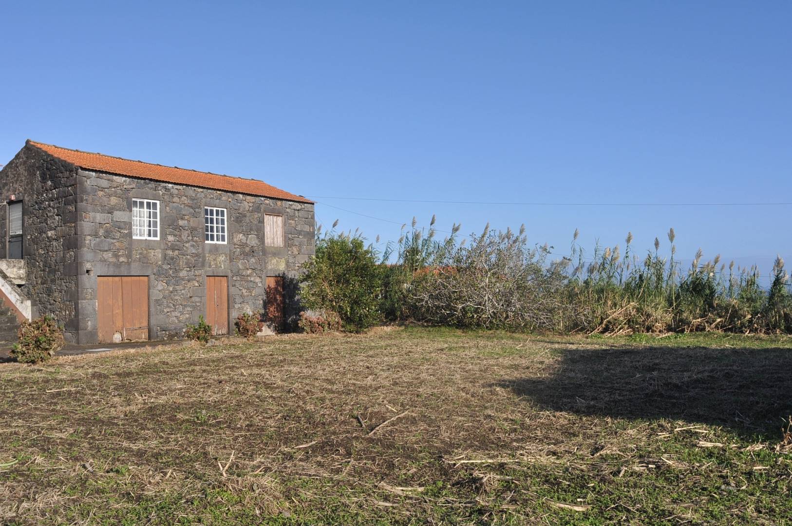 Two stone houses for sale