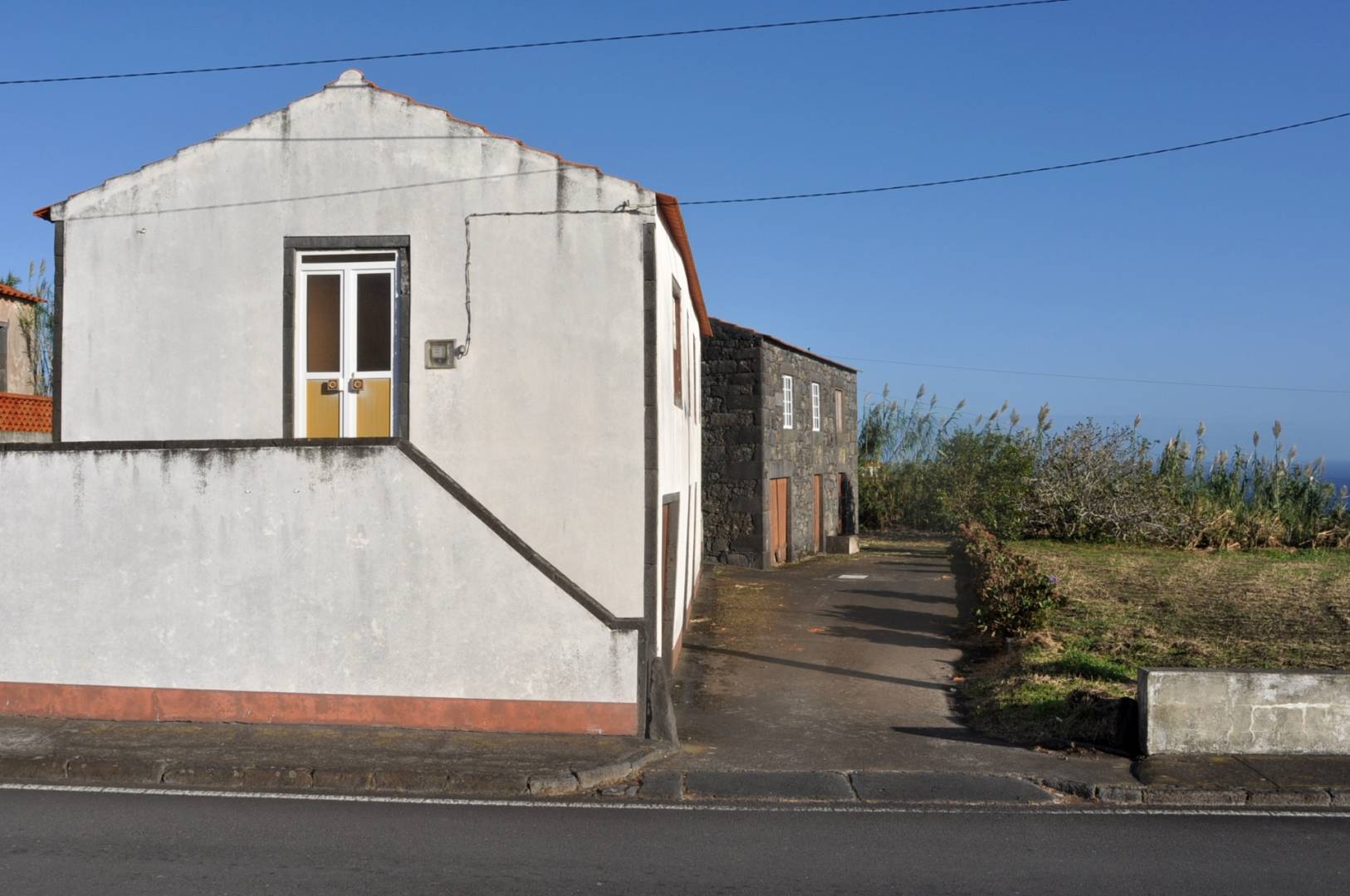 Two stone houses for sale